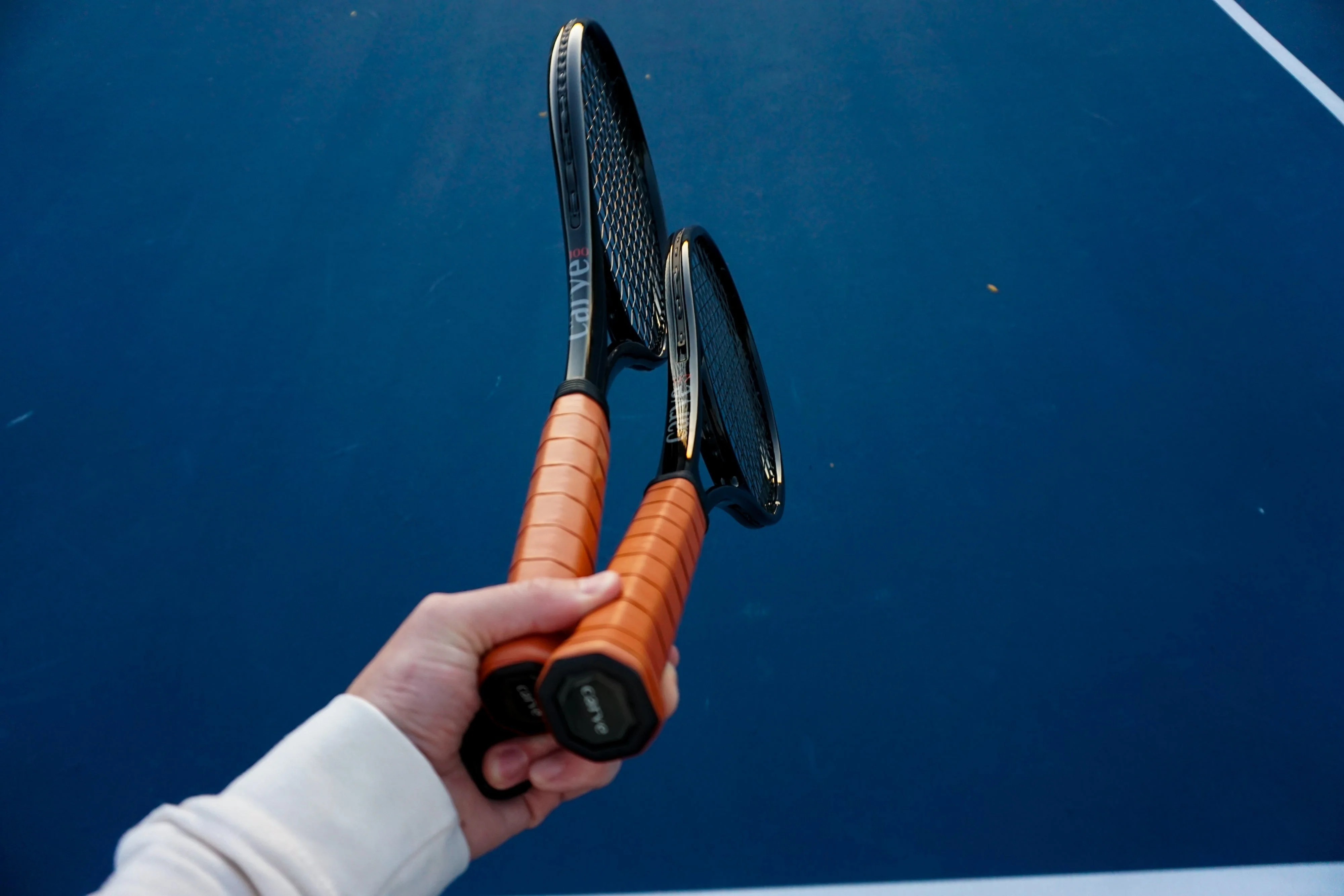 Player getting fitted for a racquet